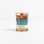 A jar of Truffle and Rosemary Sea Salt honey on a white background. 